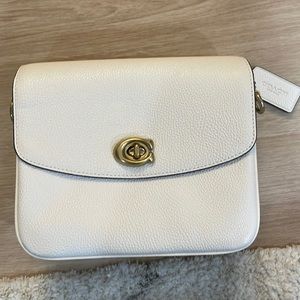 Small Coach Cassie gently used in white